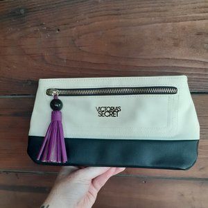 New white and black Victoria's Secret clutch with purple tassle zipper charm